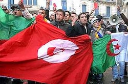 Attack on Tunisian museum leaves 21 dead, hunt for gunmen.