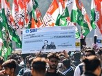 Indian Youth Congress activists protest over the impact on LIC and SBI investors due to Adani row, at Jantar Mantar in New Delhi on Monday (PTI)