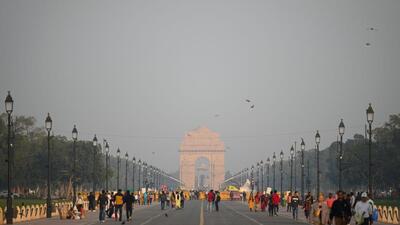 At Kartavya Path in New Delhi on Monday. India Meteorological Department forecasts show that the maximum temperature could drop by at least two degrees on Tuesday due to an increase in wind speed. (Sanchit Khanna/HT Photo) At Kartavya Path in New Delhi on Monday. India Meteorological Department forecasts show that the maximum temperature could drop by at least two degrees on Tuesday due to an increase in wind speed. (Sanchit Khanna/HT Photo)