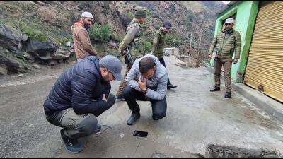 Doda administration officials visit the land subsidence-affected Nai Basti area, Thatri, in Doda on Monday. (Shanky Rathore)