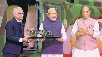 Prime Minister Narendra Modi and defence minister Rajnath Singh during the unveiling of the light utility helicopter at HAL’s manufacturing factory in Tumakuru on Monday. (ANI) Prime Minister Narendra Modi and defence minister Rajnath Singh during the unveiling of the light utility helicopter at HAL’s manufacturing factory in Tumakuru on Monday. (ANI)