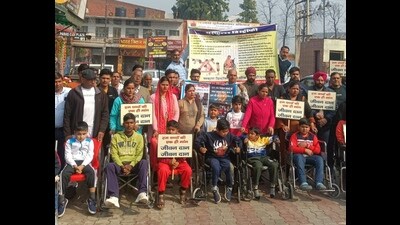 Several parents and their children suffering from a rare disease-- muscular dystrophy-- from all over the state on Monday carried out a protest march in Ambala Cantonment. (HT Photo)