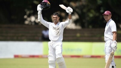 West Indies batsman Tagenarine Chanderpaul celebrates after scoring 200 runs on the third day of the Test cricket match between Zimbabwe and West Indies at Queens Sports Club in Bulawayo, Zimbabwe, Monday, Feb, 6, 2023. (AP Photo/Tsvangirayi Mukwazhi) (AP) West Indies batsman Tagenarine Chanderpaul celebrates after scoring 200 runs on the third day of the Test cricket match between Zimbabwe and West Indies at Queens Sports Club in Bulawayo, Zimbabwe, Monday, Feb, 6, 2023. (AP Photo/Tsvangirayi Mukwazhi) (AP)