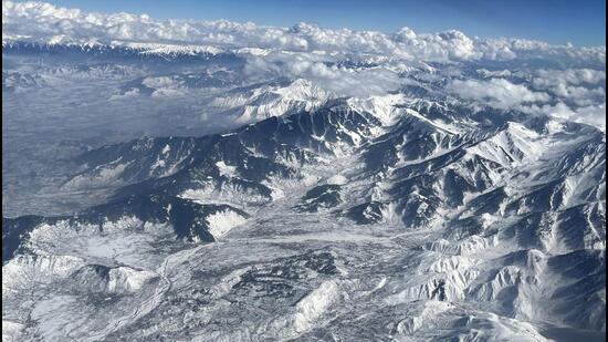 An aerial view of the snow-capped Pir Panjal Range, on Monday. (ANI)