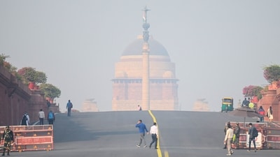 People walk near Rashtrapati Bhavan in New Delhi. (Representational image) (AFP Photo) People walk near Rashtrapati Bhavan in New Delhi. (Representational image) (AFP Photo)