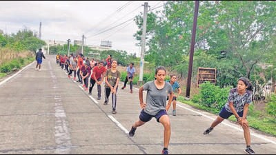 Ganesh Madhukar Dabhade, athletics coach who has trained over 100 women at the Dabhade Krida Prabhodhani in Jalna, said that increasing unemployment and lack of job opportunities in the drought-prone Marathwada region was driving women to look for job opportunities in Mumbai. “Most men there, who are either farmers or work at odd jobs, are doing very badly,” he said. “Their condition is so bad that families survive on one meal a day.” (HT PHOTO) Ganesh Madhukar Dabhade, athletics coach who has trained over 100 women at the Dabhade Krida Prabhodhani in Jalna, said that increasing unemployment and lack of job opportunities in the drought-prone Marathwada region was driving women to look for job opportunities in Mumbai. “Most men there, who are either farmers or work at odd jobs, are doing very badly,” he said. “Their condition is so bad that families survive on one meal a day.” (HT PHOTO)