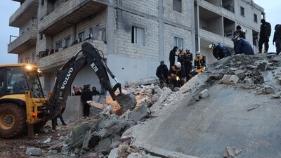 Turkey Earthquake: Members of the Syrian civil defence, known as the White Helmets look for casualties under the rubble following an earthquake, (AFP) Turkey Earthquake: Members of the Syrian civil defence, known as the White Helmets look for casualties under the rubble following an earthquake, (AFP)