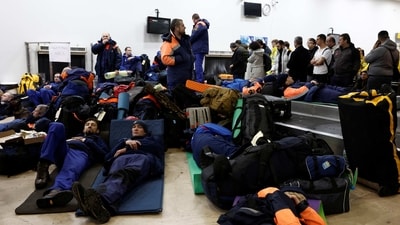 Members of the Russian Emergency Situations Ministry arrive at the Adana Sakirpasa Airport in Turkey on Tuesday. (REUTERS)