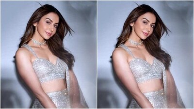 Rakul Preet further teamed it with a matching silver long and flowy skirt and added a silver georgette dupatta featuring silver zari borders. (Instagram/@rakulpreet) Rakul Preet further teamed it with a matching silver long and flowy skirt and added a silver georgette dupatta featuring silver zari borders. (Instagram/@rakulpreet)