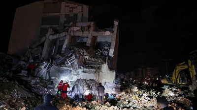A rescue team works on a collapsed building, following an earthquake in Iskenderun, Turkey Monday. REUTERS/Umit Bektas (REUTERS)