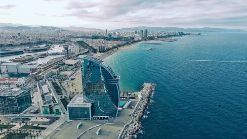 Enjoy a romantic dinner at a local tapas bar or watch the sunset from the beach. (Unsplash)