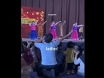 The image, taken from the video, shows the dad performing the entire dance routine with other kids. The image, taken from the video, shows the dad performing the entire dance routine with other kids.