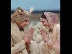 Sidharth Malhotra and Kiara Advani in their wedding outfits. Sidharth Malhotra and Kiara Advani in their wedding outfits.