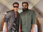 Karan Johar and Mohanlal travel together.