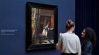 Women stand in front of Vermeer's “Allegory of the Catholic faith” at the Rijksmuseum in Amsterdam, on February 6. The show in Amsterdam opens on February 10 and runs to June 4. It has already become the Rijksmuseum's most in-demand exhibition, with nearly 200,000 being sold so far, AP reported. Women stand in front of Vermeer's “Allegory of the Catholic faith” at the Rijksmuseum in Amsterdam, on February 6. The show in Amsterdam opens on February 10 and runs to June 4. It has already become the Rijksmuseum's most in-demand exhibition, with nearly 200,000 being sold so far, AP reported. 