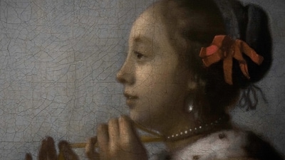 A close-up of “Woman with a Pearl Necklace”, on loan from Staatliche Museen, Berlin, by Amsterdam's Rijksmuseum for the Vermeer exhibit. Some masterpieces have had a longer journey for the exhibition that has been some eight years in the making. "Officer and Laughing Girl," “Mistress and Maid” and “Girl Interrupted at her Music” flew from the U.S. East Coast, leaving the Frick Collection while the New York museum undergoes restoration. (Peter Dejong / AP ) A close-up of “Woman with a Pearl Necklace”, on loan from Staatliche Museen, Berlin, by Amsterdam's Rijksmuseum for the Vermeer exhibit. Some masterpieces have had a longer journey for the exhibition that has been some eight years in the making. "Officer and Laughing Girl," “Mistress and Maid” and “Girl Interrupted at her Music” flew from the U.S. East Coast, leaving the Frick Collection while the New York museum undergoes restoration. (Peter Dejong / AP )