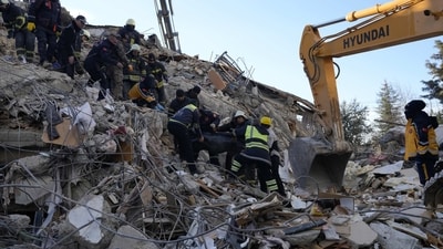Thinly stretched rescue teams worked through the night into Wednesday, pulling more bodies from the rubble of thousands of buildings downed in Turkey and Syria by a catastrophic earthquake. (AP)