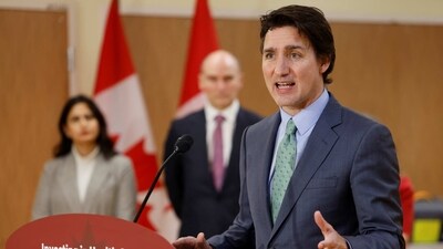 Canada's Prime Minister Justin Trudeau, with federal cabinet ministers, takes part in a news conference after touring a medical training facility in Ottawa, Ontario, Canada, February 7. (REUTERS)