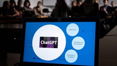 Teachers are seen behind a laptop during a workshop on ChatGpt bot organised for by the School Media Service (SEM) of the Public education of the Swiss canton of Geneva. (AFP) Teachers are seen behind a laptop during a workshop on ChatGpt bot organised for by the School Media Service (SEM) of the Public education of the Swiss canton of Geneva. (AFP)