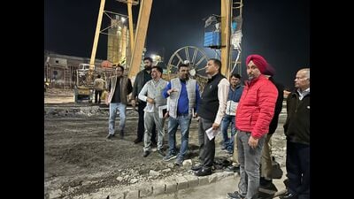 NHAI officials during inspection at the construction site of the elevated road project. (HT Photo) NHAI officials during inspection at the construction site of the elevated road project. (HT Photo)