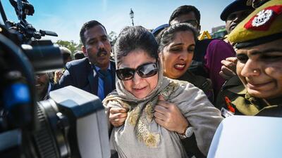 PDP chief Mehbooba Mufti being detained by a cop during her protest against the anti-encroachment drives, in New Delhi on Wednesday. (Sanchit Khanna/HT) PDP chief Mehbooba Mufti being detained by a cop during her protest against the anti-encroachment drives, in New Delhi on Wednesday. (Sanchit Khanna/HT)