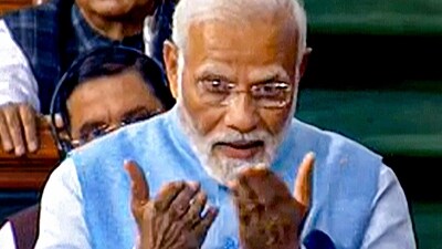 Prime Minister Narendra Modi replies to the Motion of Thanks on the President's address in the Lok Sabha during Budget Session of Parliament, in New Delhi, Wednesday, Feb. 8, 2023. (PTI) Prime Minister Narendra Modi replies to the Motion of Thanks on the President's address in the Lok Sabha during Budget Session of Parliament, in New Delhi, Wednesday, Feb. 8, 2023. (PTI)
