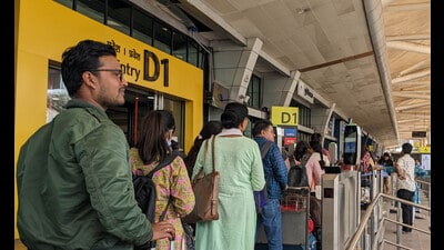 Passengers in a queue in front of the Digi Yatra app kiosk at Gate D1 of Pune’s Lohegaon international airport on Wednesday. (Shankar Narayan/HT PHOTO)