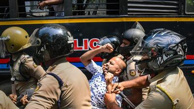 Police detain Youth Congress members during their protest over the Kerala budget, in Kochi. (PTI) Police detain Youth Congress members during their protest over the Kerala budget, in Kochi. (PTI)