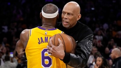 Los Angeles Lakers forward LeBron James, left, is hugged by Kareem Abdul-Jabbar after passing Abdul-Jabbar to become the NBA's all-time leading scorer (AP) Los Angeles Lakers forward LeBron James, left, is hugged by Kareem Abdul-Jabbar after passing Abdul-Jabbar to become the NBA's all-time leading scorer (AP)