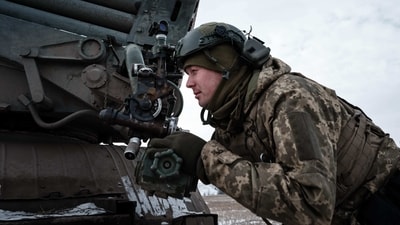 A Ukrainian serviceman of the artillery unit of the 80th Air Assault Brigade adjusts through the scope near Bakhmut on February 7, amid the Russian invasion of Ukraine. (AFP) A Ukrainian serviceman of the artillery unit of the 80th Air Assault Brigade adjusts through the scope near Bakhmut on February 7, amid the Russian invasion of Ukraine. (AFP)
