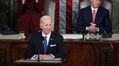 Joe Biden: US Vice President Kamala Harris stands and applauds while Speaker of the House Kevin McCarthy remains seated after President Joe Biden speaks. (Reuters)