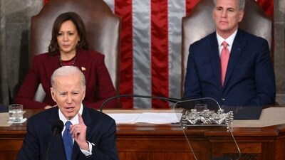 US Vice President Kamala Harris and US Speaker of the House Kevin McCarthy (R-CA) listen as US President Joe Biden delivers the State of the Union address in the House Chamber of the US Capitol in Washington, DC, on Tuesday. (AFP)