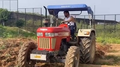 MS Dhoni shared a video on Instagram, where he can be seen driving a tractor (Screengrab) MS Dhoni shared a video on Instagram, where he can be seen driving a tractor (Screengrab)