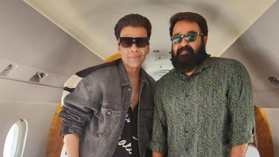 Karan Johar and Mohanlal travel together.