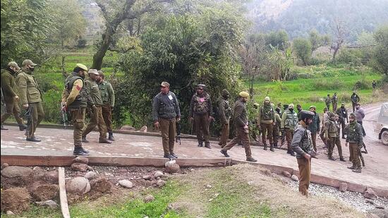 Security personnel at the Dhangri village. (Agencies)