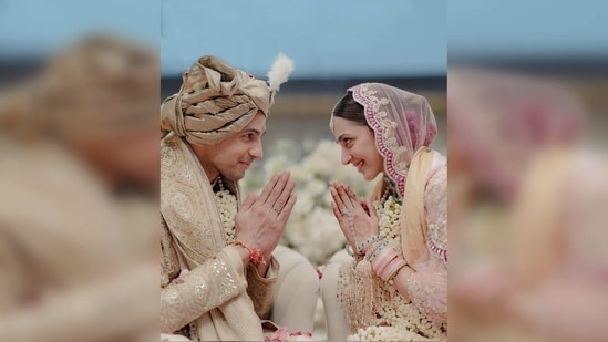 Kiara Advani donned a gorgeous blush pink embellished lehenga and her beau Sidharth Malhotra complimented his better half in an ivory sherwani.&nbsp;(Instagram/@sidharthmalhotra)