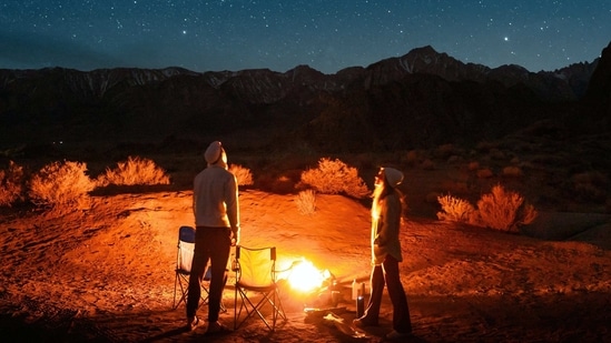 Stargazing: Find a quiet spot outside, such as a park or beach, and spend some time admiring the stars and enjoying each other's company. This is a romantic and peaceful way to spend an evening together.(pexels)