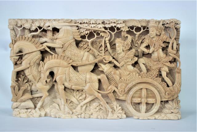 A handmade wooden carving depicting Krishna and Arjun in the Mahabharata. The piece is from Bali, Indonesia. (Shutterstock) A handmade wooden carving depicting Krishna and Arjun in the Mahabharata. The piece is from Bali, Indonesia. (Shutterstock)
