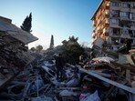Turkey Earthquake: A man walks through the rubble of destroyed buildings in Antakya, southern Turkey. Turkey Earthquake: A man walks through the rubble of destroyed buildings in Antakya, southern Turkey.