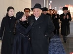 North Korean leader Kim Jong Un, his wife Ri Sol Ju and their daughter Kim Ju Ae attend a military parade to mark the 75th founding anniversary of North Korea's army.