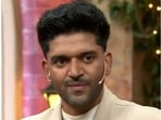Kiku Sharda and Guru Randhawa in stills from The Kapil Sharma Show promo. 