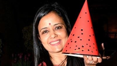 Mahua Moitra with the red cap that she produced in the Lok Sabha to symbolise that the government has been fooled by Adani. Mahua Moitra with the red cap that she produced in the Lok Sabha to symbolise that the government has been fooled by Adani.