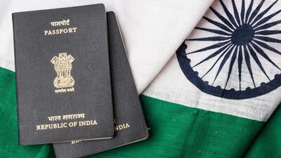 Indian passport and authentic indian tricolour flag made up of khadi or pure cotton material - Stock image (Getty Images/iStockphoto) Indian passport and authentic indian tricolour flag made up of khadi or pure cotton material - Stock image (Getty Images/iStockphoto)