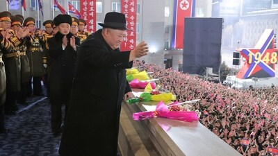 North Korea Kim Jong Un: North Korean leader Kim Jong Un greets the crowd during a military parade. (Reuters)