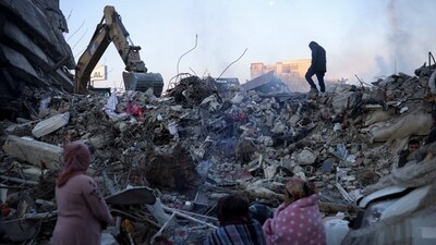 People gather at the rubble in the aftermath of a deadly earthquake in Kahramanmaras, (REUTERS)