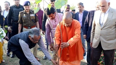 Uttar Pradesh chief minister Yogi Adityanath planting a sapling at the venue of the Global Investors Summit in Lucknow. (HT Photo) Uttar Pradesh chief minister Yogi Adityanath planting a sapling at the venue of the Global Investors Summit in Lucknow. (HT Photo)