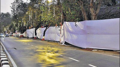 White curtains put up to conceal the view of slums on P. D'Mello Road going towards CSMT Station ahead of PM Narendra Modi's visit. (Bhushan Koyande/HT Photo)