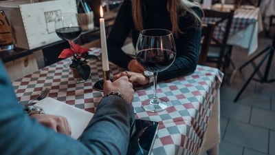 Candle Light Dinner: A candlelight dinner is the most romantic way to express your love. Hold your partner's hand and tell them how much they mean to you in the middle of your date as you enjoy a scrumptious meal.&nbsp; (Unsplash)