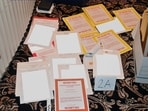 FILE - This image contained in a court filing by the Department of Justice on Aug. 30, 2022, and redacted by in part by the FBI, shows a photo of documents seized during the Aug. 8 search by the FBI of former President Donald Trump's Mar-a-Lago estate in Florida. The discovery of classified documents at the home of former Vice President Mike Pence is scrambling the blame game in Washington. Now, lawmakers from both parties seem united in frustration with the string of mishaps in the handling of the U.S. government's secrets.(Department of Justice via AP, File) FILE - This image contained in a court filing by the Department of Justice on Aug. 30, 2022, and redacted by in part by the FBI, shows a photo of documents seized during the Aug. 8 search by the FBI of former President Donald Trump's Mar-a-Lago estate in Florida. The discovery of classified documents at the home of former Vice President Mike Pence is scrambling the blame game in Washington. Now, lawmakers from both parties seem united in frustration with the string of mishaps in the handling of the U.S. government's secrets.(Department of Justice via AP, File)