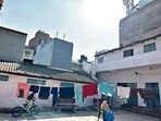 In blue sari and white hair, she at 90 is like a lesser-known but still a notable Walled City monument. In blue sari and white hair, she at 90 is like a lesser-known but still a notable Walled City monument.